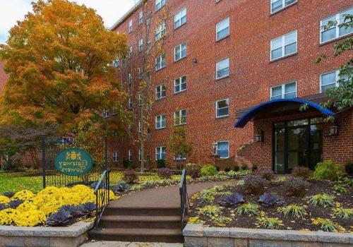 Exterior view of residential buildings at The Gateway Towers at Packer Park apartments for rent